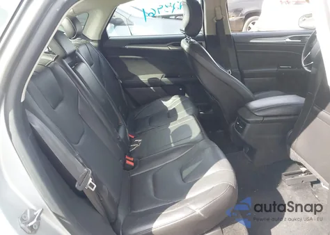 2016 Ford Fusion Titanium z USA, uszkodzony, nr VIN 3FA6P0K98GR135129